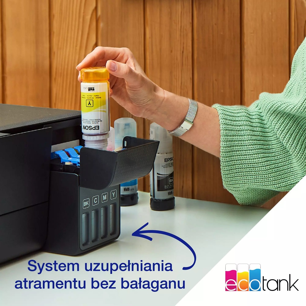 Drukarka atramentowa Epson EcoTank L1230 czarna grafika przedstawia napełnianie drukarki atramentem